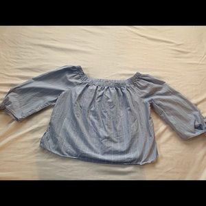 Light blue and white stripe shirt.